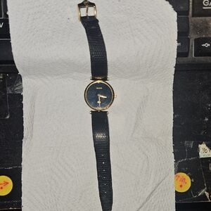 Gucci Watch with Black Strap and Gold Accents